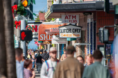 People walking on street in city