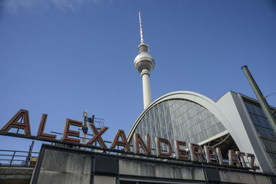 Low angle view of building against blue sky