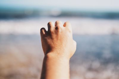 Low section of man in sea