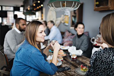 Women having brunch with friends at table