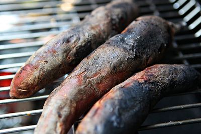 Close-up of meat on barbecue grill