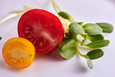 Close-up of fruits against white background