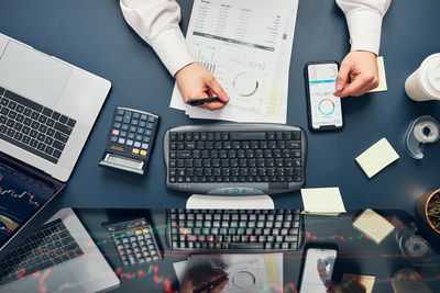 High angle view of business people working on table