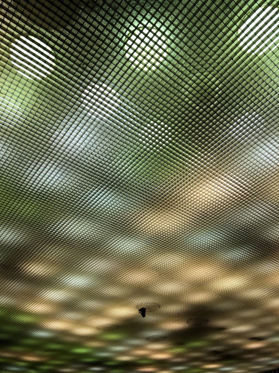 FULL FRAME SHOT OF WATER DROPS ON GLASS