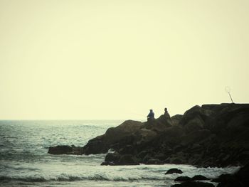 Scenic view of sea against clear sky