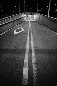 Illuminated road at night