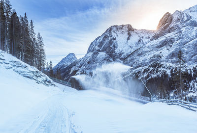 Scenic view of snow covered mountains