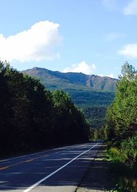 Country road passing through landscape