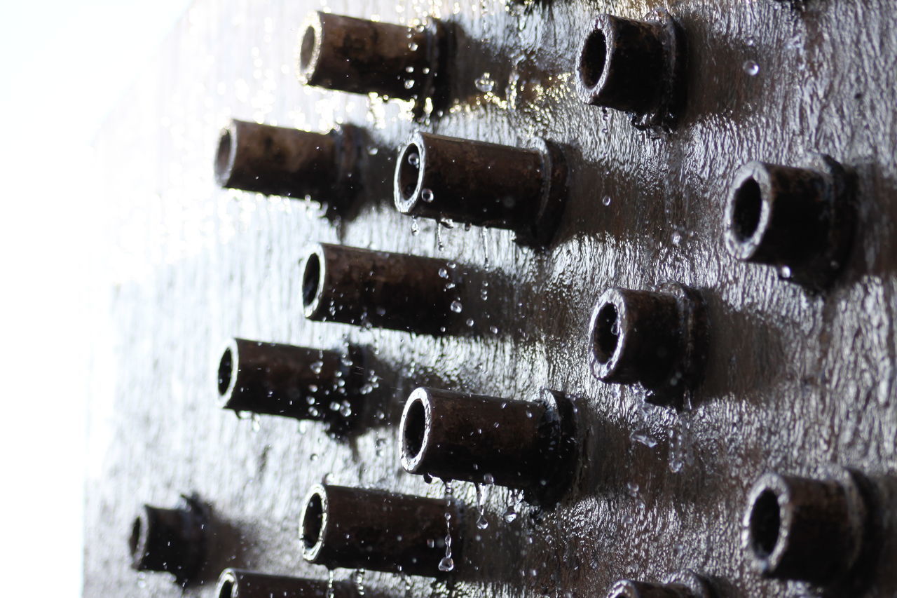 FULL FRAME SHOT OF OLD WINE BOTTLES