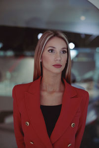 Portrait of young woman looking away