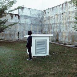 Full length of woman standing in park