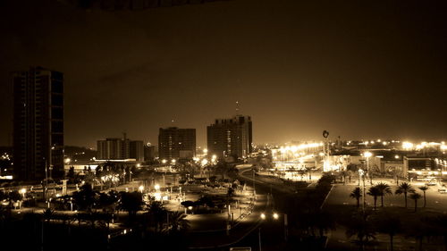 View of city lit up at night