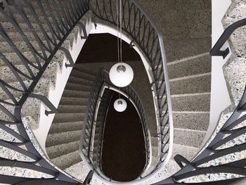 Directly below shot of spiral staircase of building