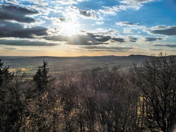 Scenic view of landscape against sky during sunset