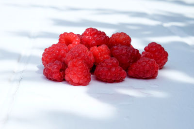 Close-up of frozen strawberries on table