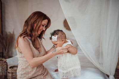 Mother and daughter at home