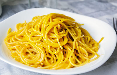 Close-up of noodles served in plate