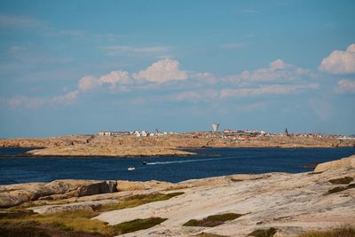 Scenic view of beach and sea against sky