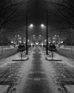 Empty road in winter at night