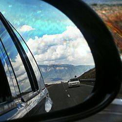 Close-up of reflection of clouds in water