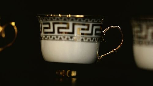Close-up of drink at black background