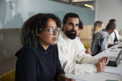 Business colleagues working in office