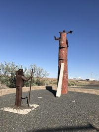 View of statue against clear blue sky