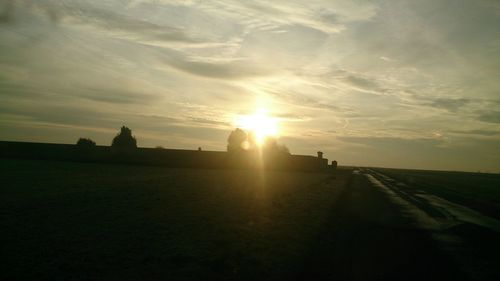 Scenic view of landscape at sunset