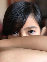 Close-up portrait of a serious young woman