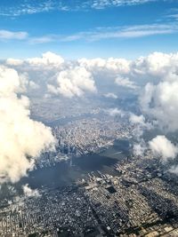 Aerial view of cityscape against sky