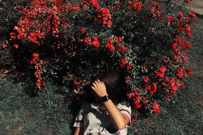 Girl with flowers on tree