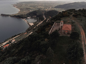 High angle view of townscape by sea