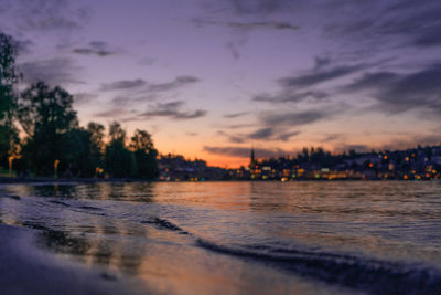 Scenic view of sea against sky at sunset