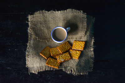 High angle view of coffee cup on table