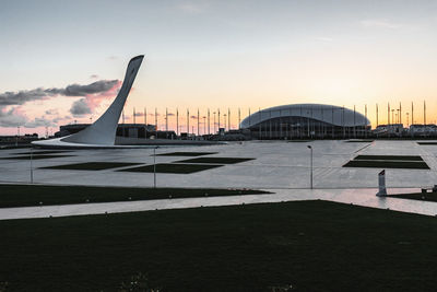 View of modern building against cloudy sky