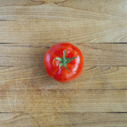 High angle view of tomatoes on cutting board