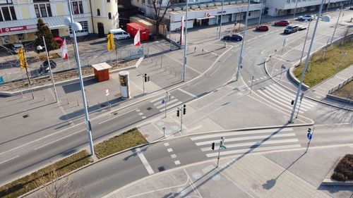 High angle view of people walking on road