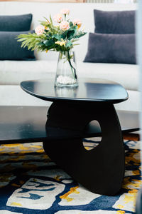 Close-up of flower vase on table