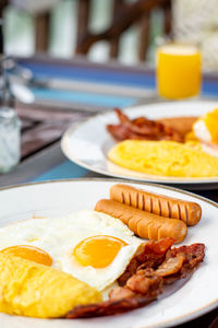 Close-up of breakfast served on table