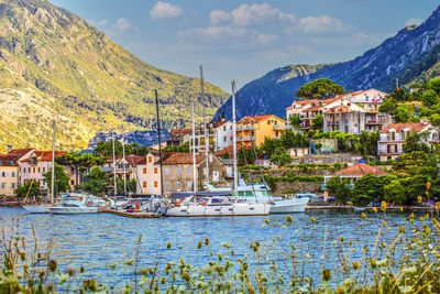 View yachts of bay of kotor. pleasure boats and yachts at pier on resort town of kotor, montenegro