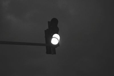 Low angle view of illuminated lamp