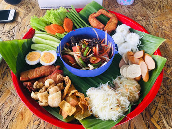 High angle view of fruits in bowl on table