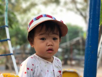 Portrait of cute baby girl at park