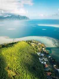 Aerial view of mountain by sea