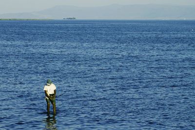 Man standing in sea