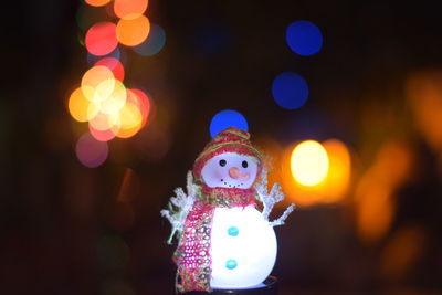 Illuminated christmas tree at night