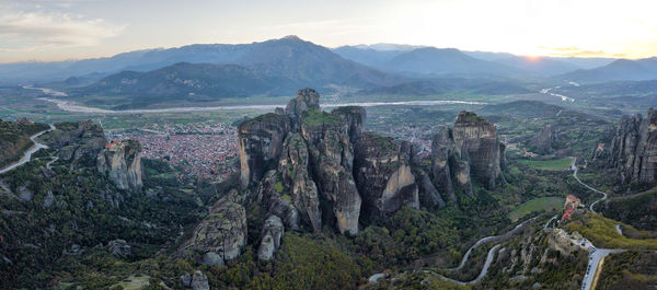 Panoramic view of landscape against cloudy sky