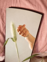 Close-up of woman hand holding book