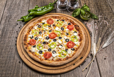 High angle view of pizza in bowl on table