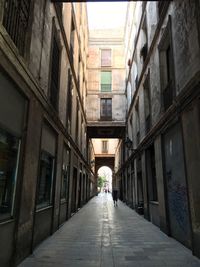 Narrow alley along buildings